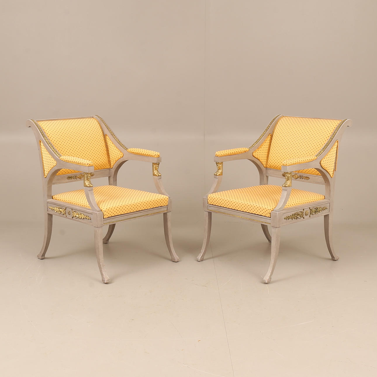 Two Empire style armchairs, 20th century.