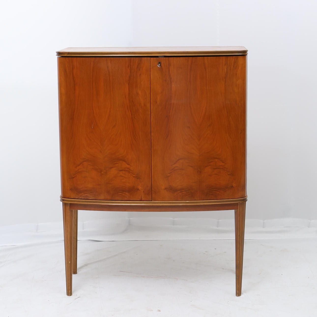 A Swedish modern 1940s bar cabinet.