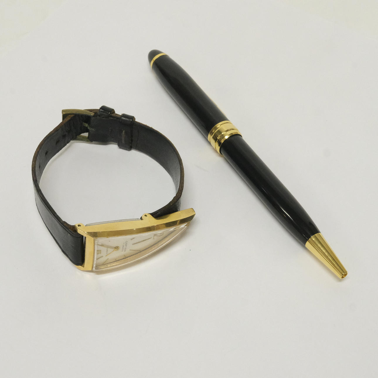 WRISTWATCH AND PEN.
