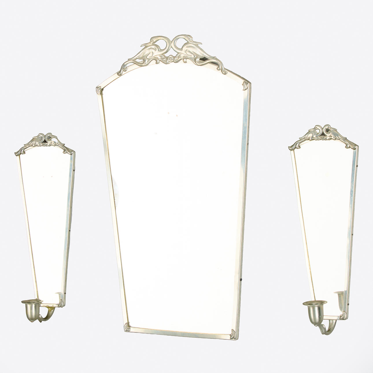 MIRROR AND WALL SCONCES. A pair, pewter, 1930s.