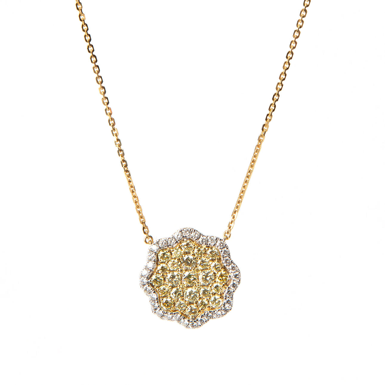 COLLIER, 18k guld och vitguld med briljantslipade vita och gula diamanter, totalt ca 3.52 ct.