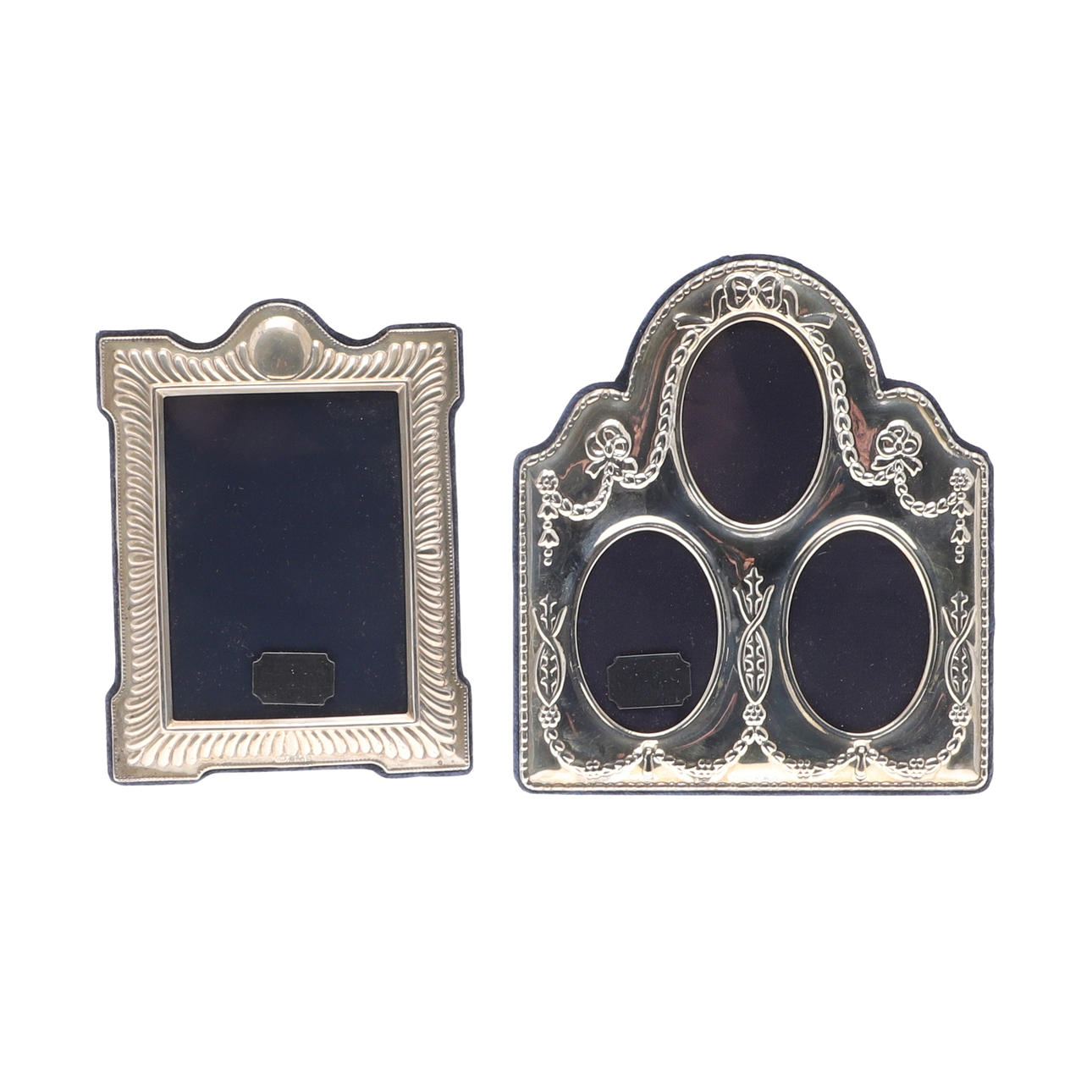 TWO MODERN SILVER PHOTO FRAMES.