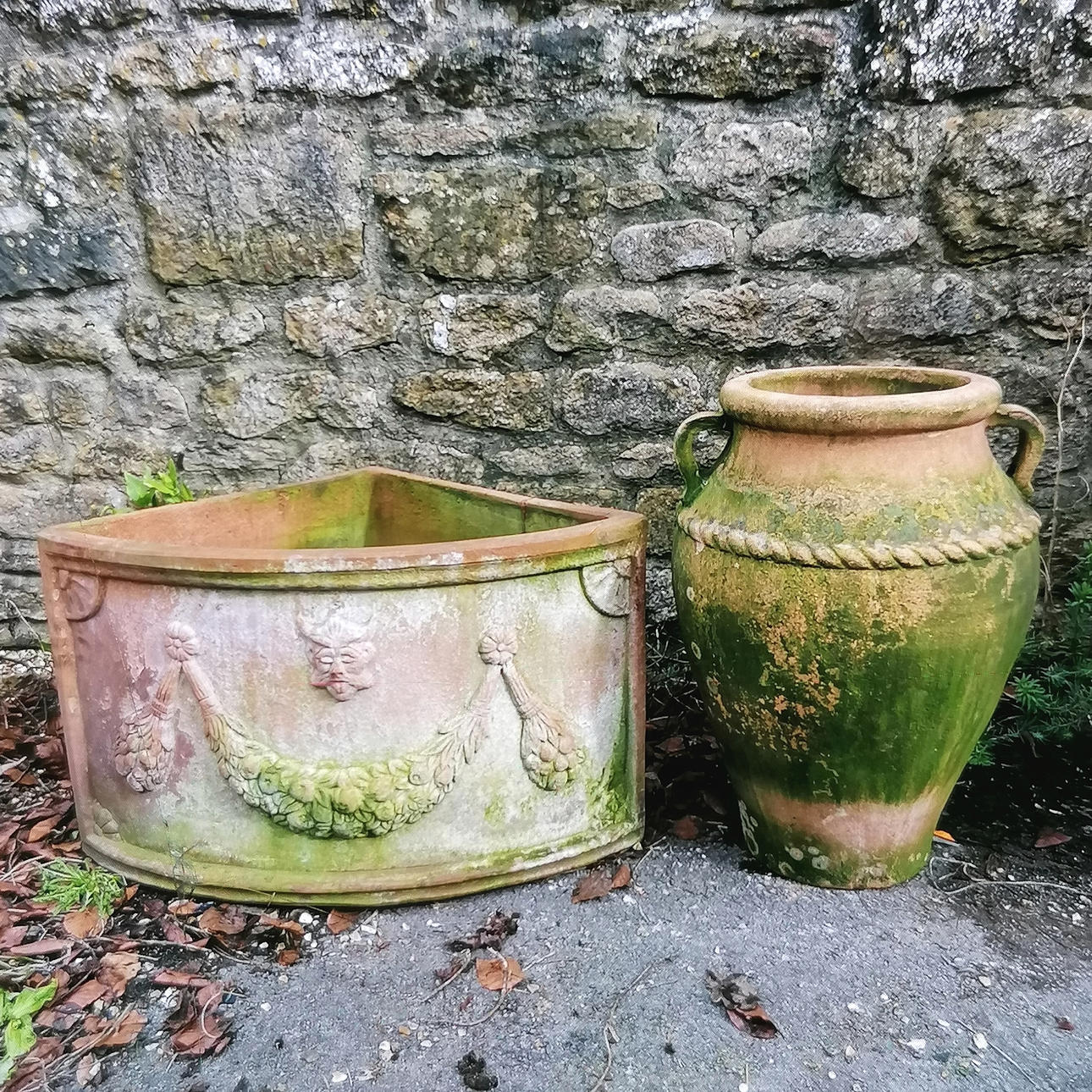 TERRACOTTA CORNER PLANTER T/W URN.