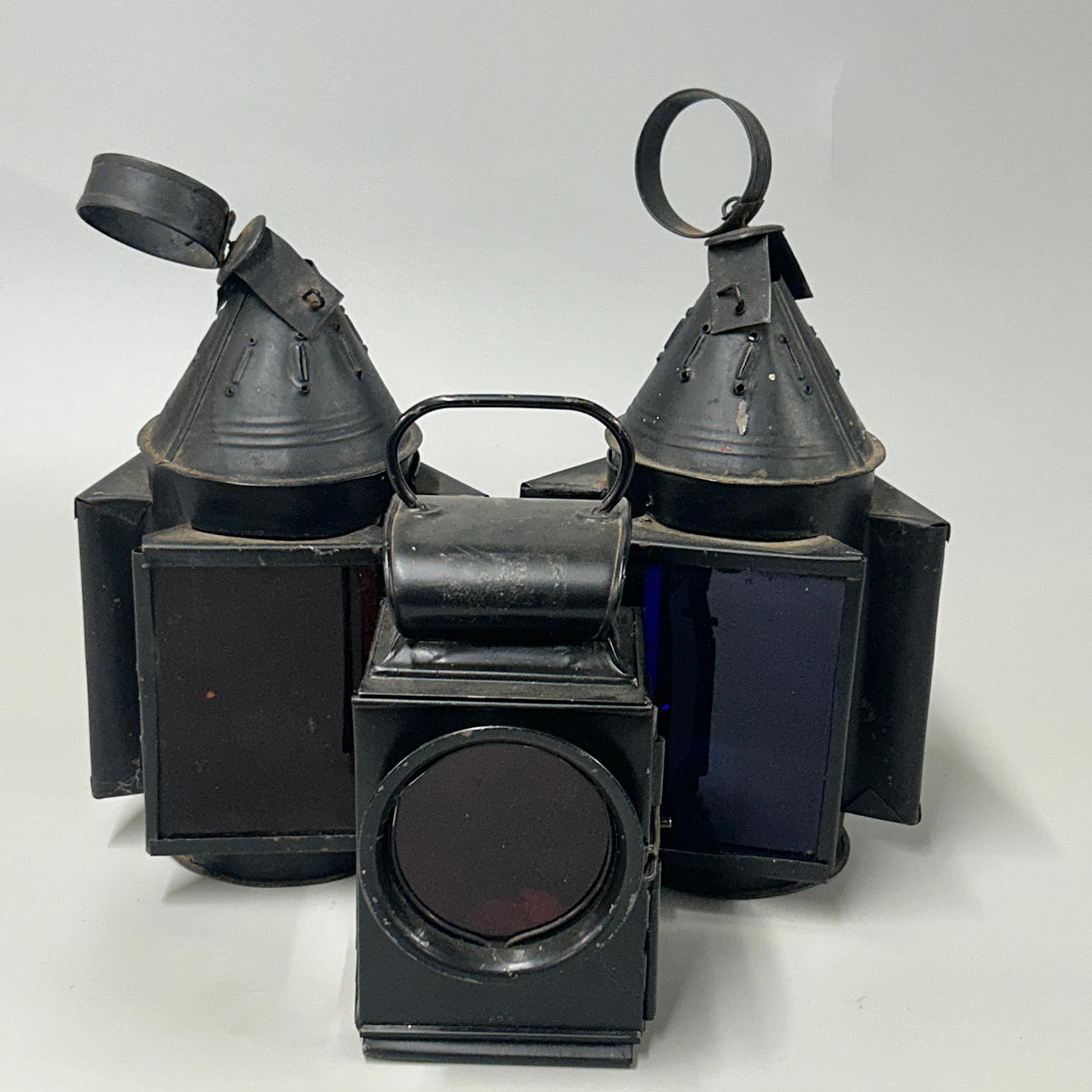 THREE SHIPPING LAMPS.