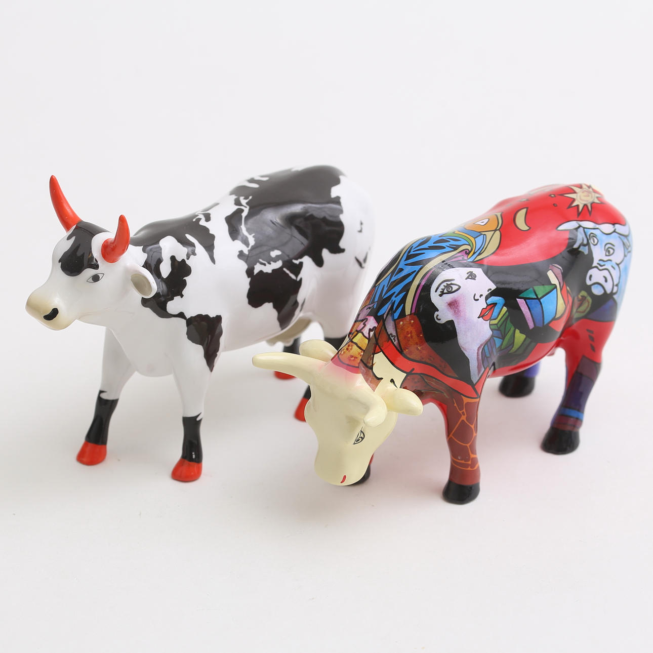 A set of two “Cow Parade” figurines, art mass, 2002/2007. Art