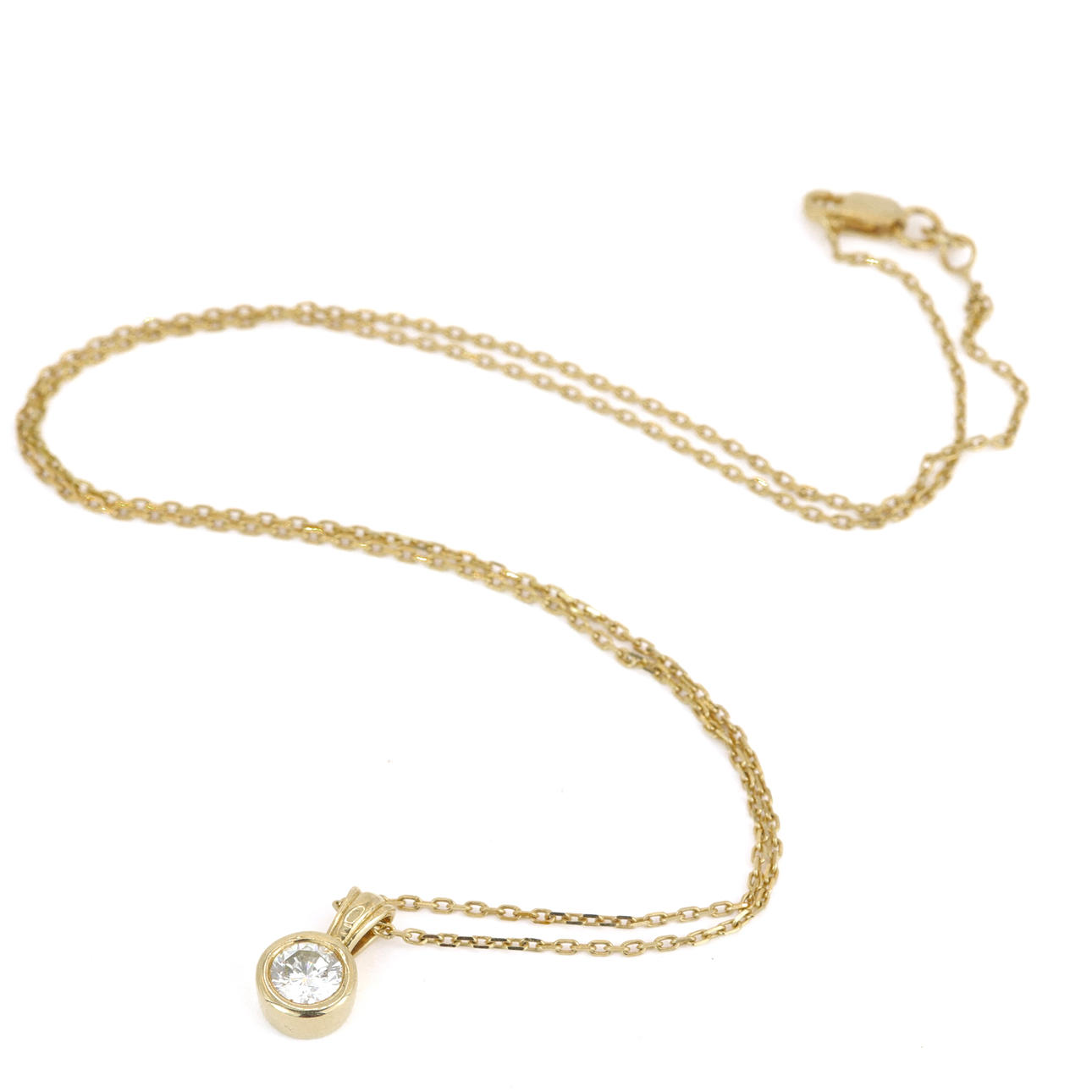 18CT DIAMOND SET PENDANT & 9CT CHAIN.