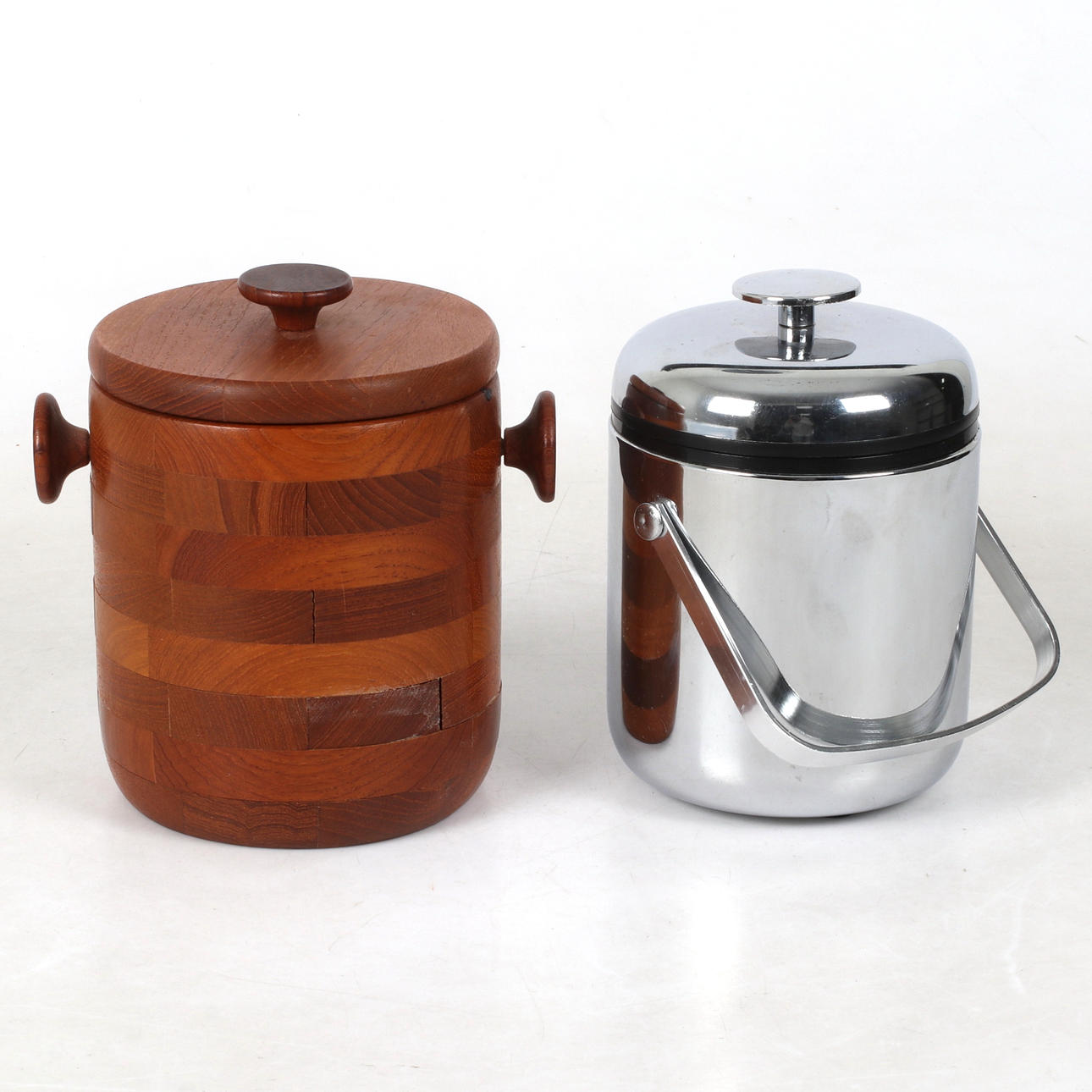 Two teak and plastic ice buckets, 20th century.