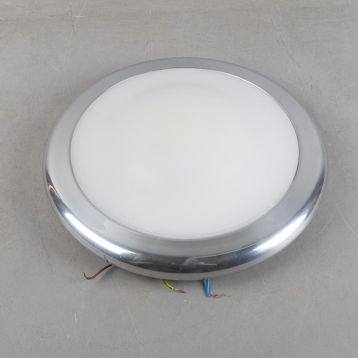 A ceiling lamp, possibly Jasper Morrison, 19th/2000s.