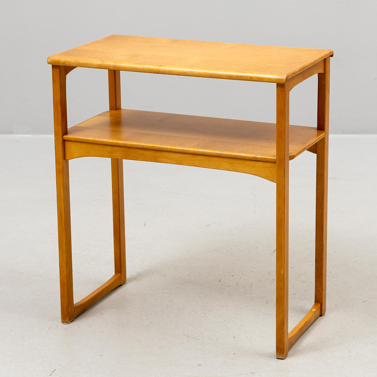 A 20th century birch side table.