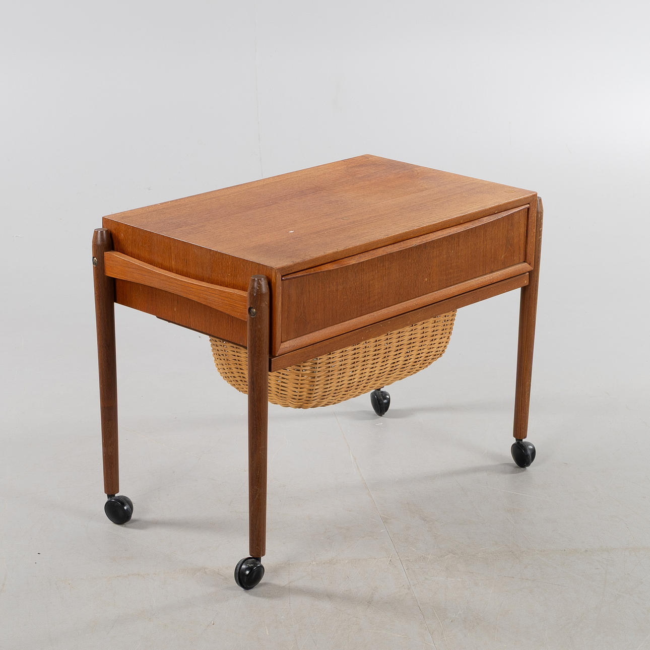 A SEWING TABLE, veneered in teak, Denmark, 1960s.