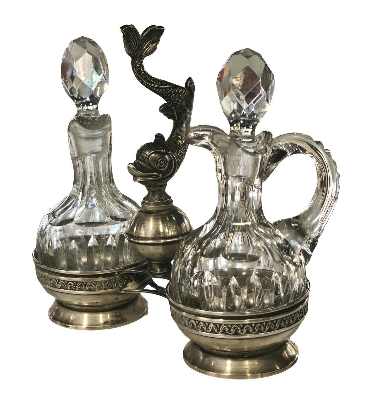 Cruet set in crystal and hallmarked silver.
