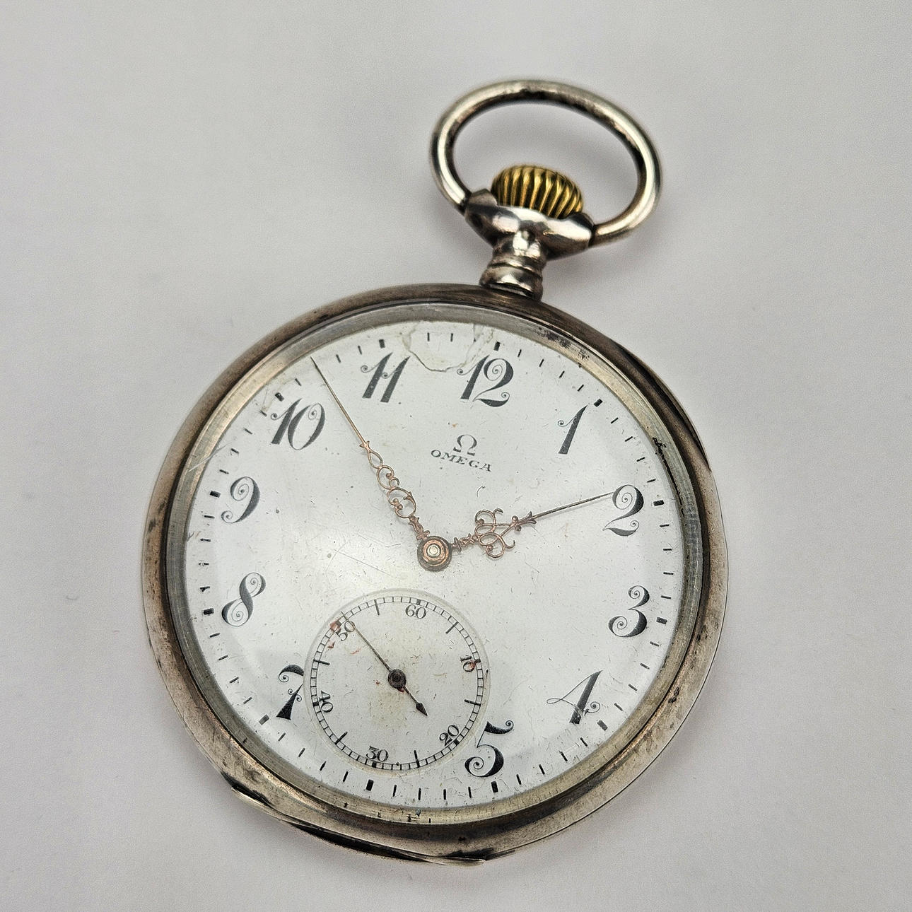 OMEGA. Fickur, silver.