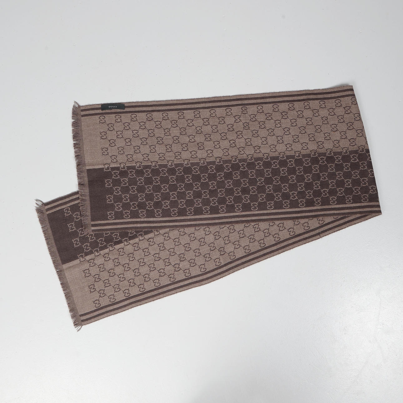 GUCCI "G G" MONOGRAM JACQUARD WOOL SCARF.