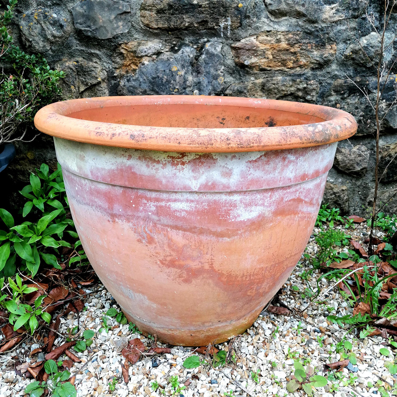 LARGE CIRCULAR TERRACOTTA PLANTER.