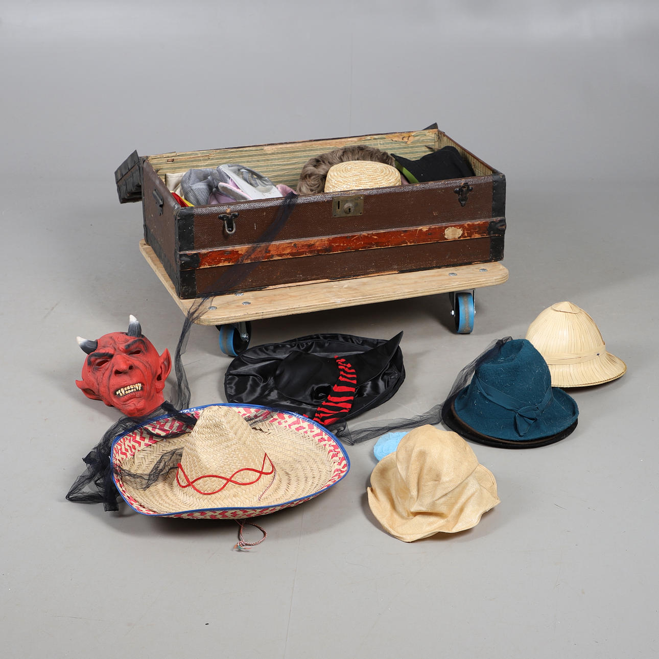 TRUNK WITH ASSORTED COSTUME ACCESSORIES.