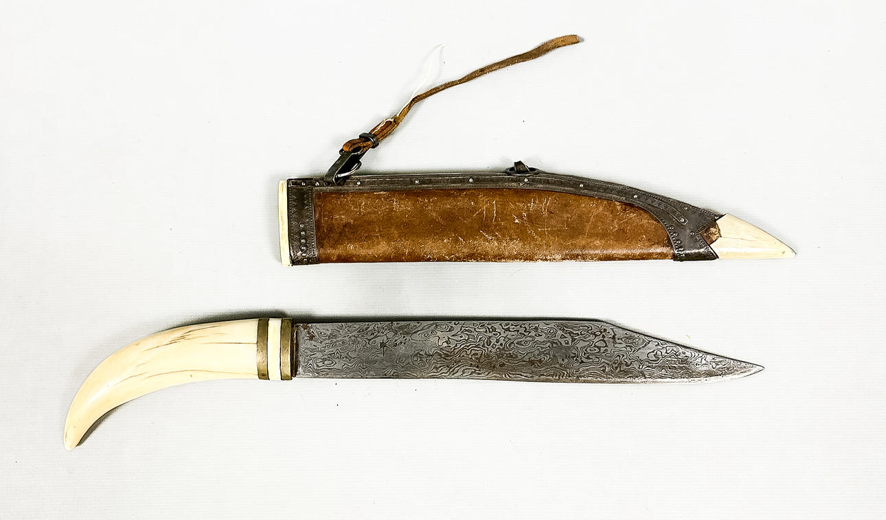 A metal bone dagger, 20th century.