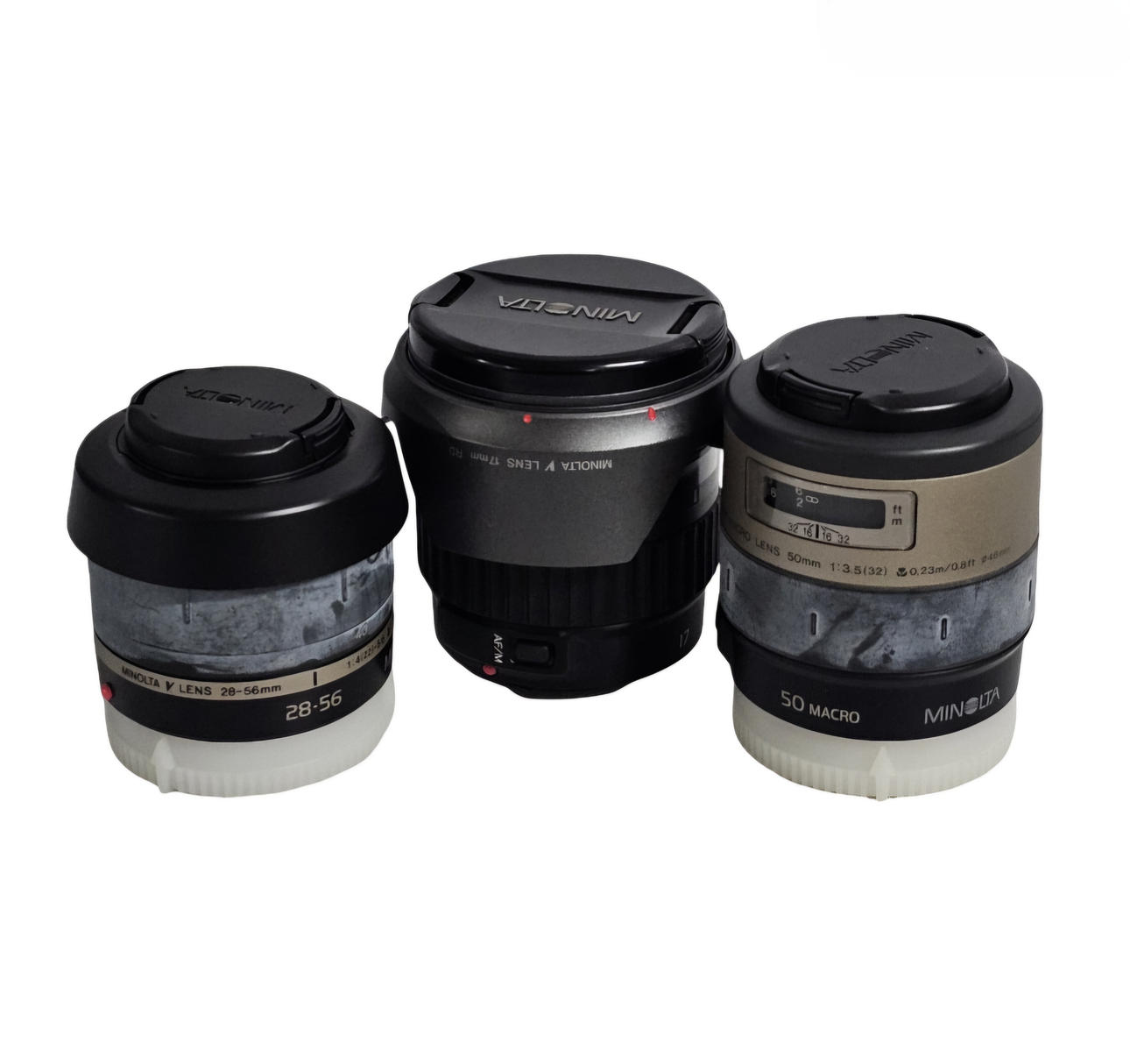 Minolta. Three Model V Objectives.