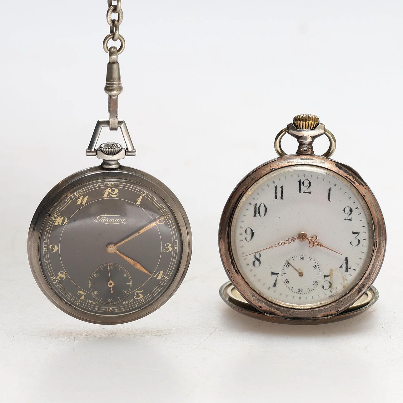 A pocket watch, 2 pieces one in silver.