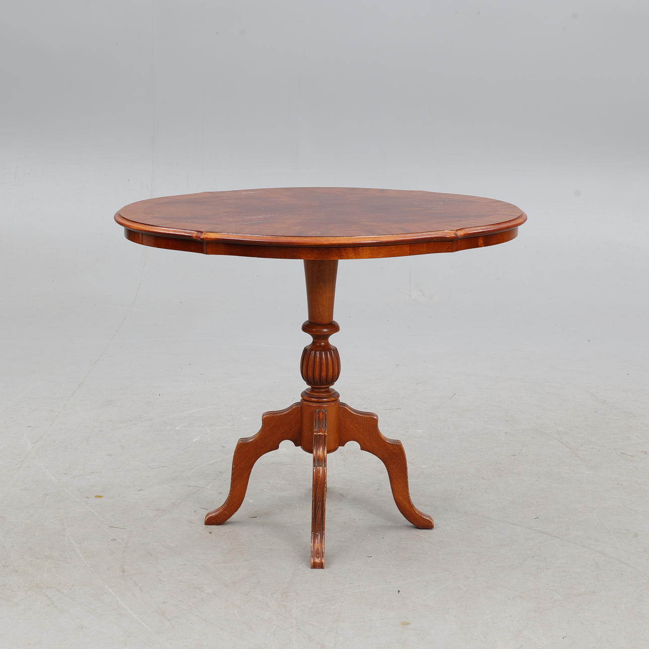 A rococo style pillar table, mid 20th century.