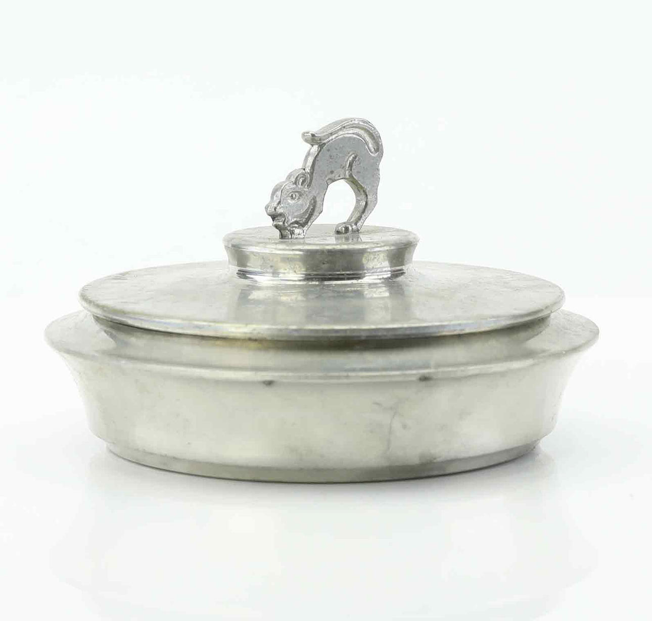 A 1930's Art Déco tin lockask.