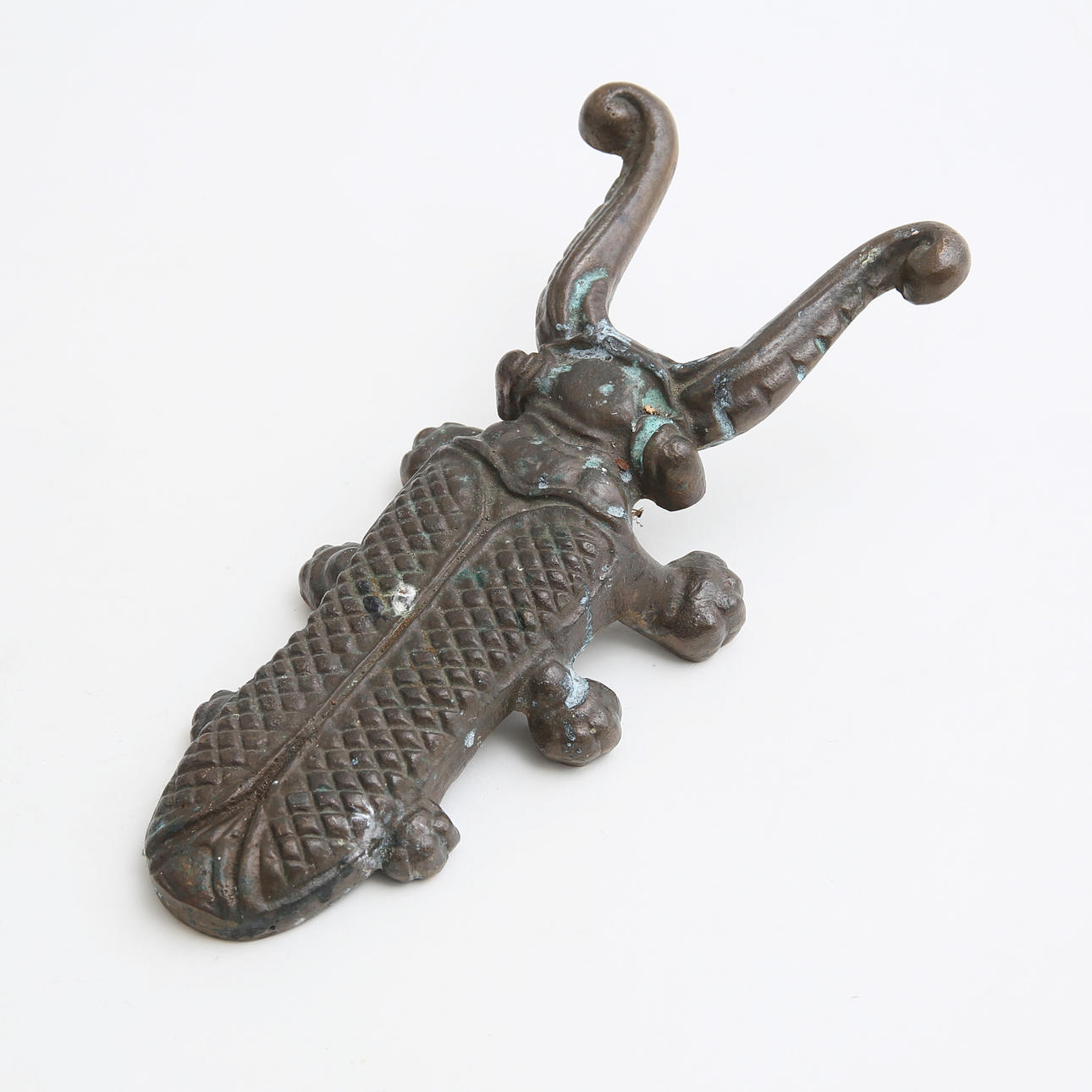 A metal boot jack, 20th century.