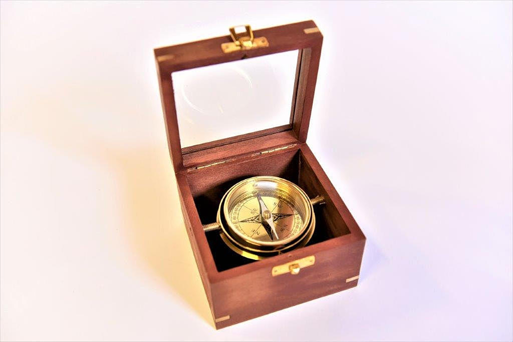 COMPASS in wooden box.