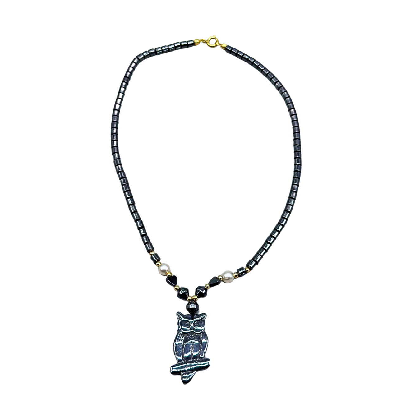 HEMATITE NECKLACE WITH AN OWL PENDANT.