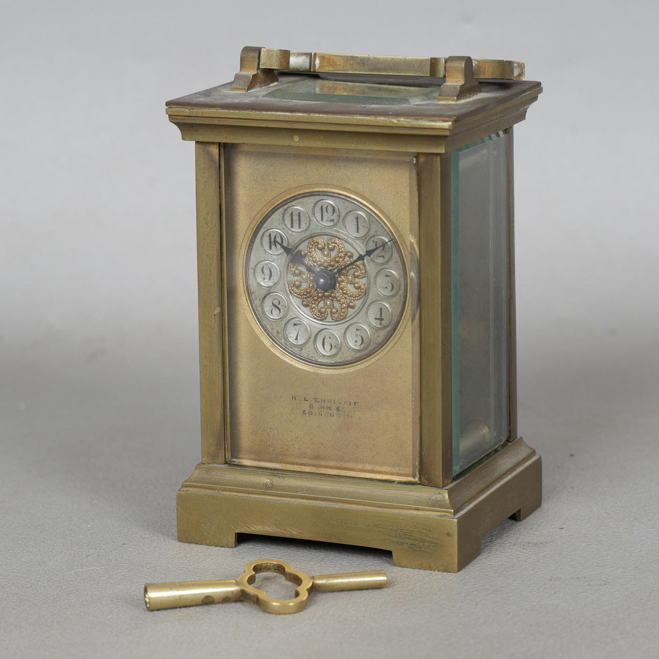 A LATE 19TH CENTURY BRASS-CASED CARRIAGE CLOCK BY R.L. CHRISTIE BINKS ...