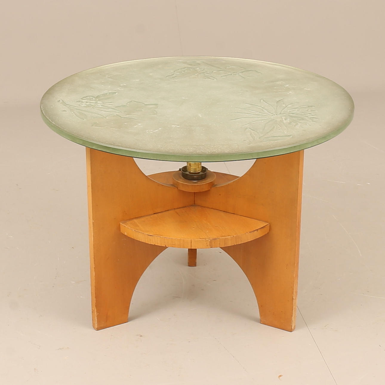 A table, wood, glass, 1940s.