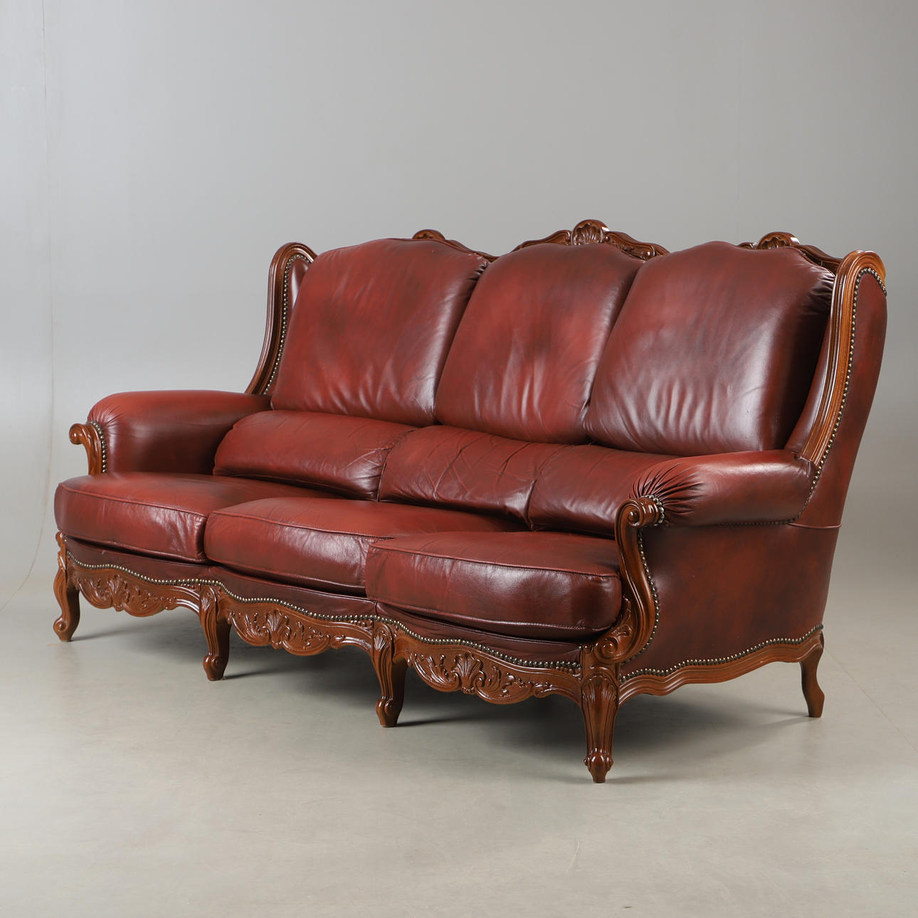 SOFA, leather and beech, rococo style.