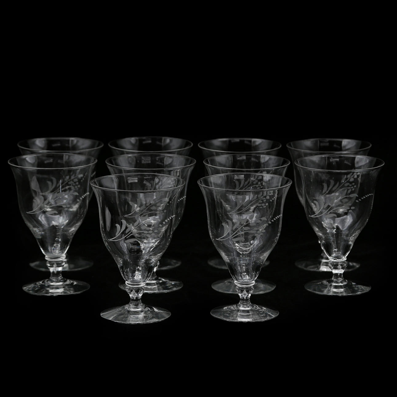 10 WINE GLASSES WITH ETCHED DECOR.