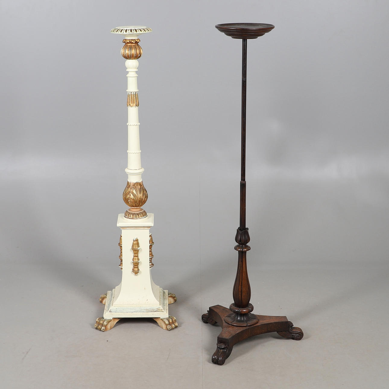 CARVED PEDESTAL TORCHERE WITH ANOTHER.