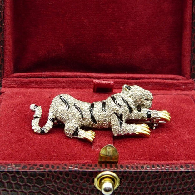 DIAMOND ENCRUSTED TIGER BROOCH.