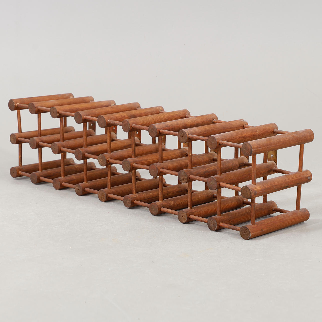 A wine rack, stained pine, 2000's.