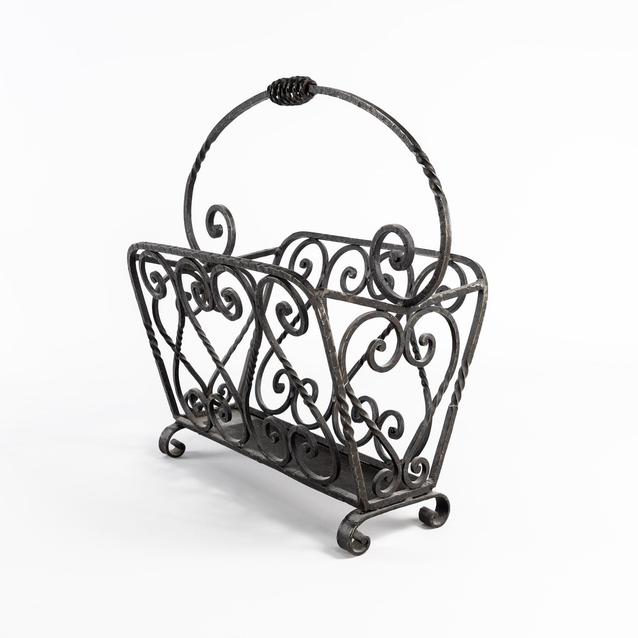 MAGAZINE RACK. Wrought iron.