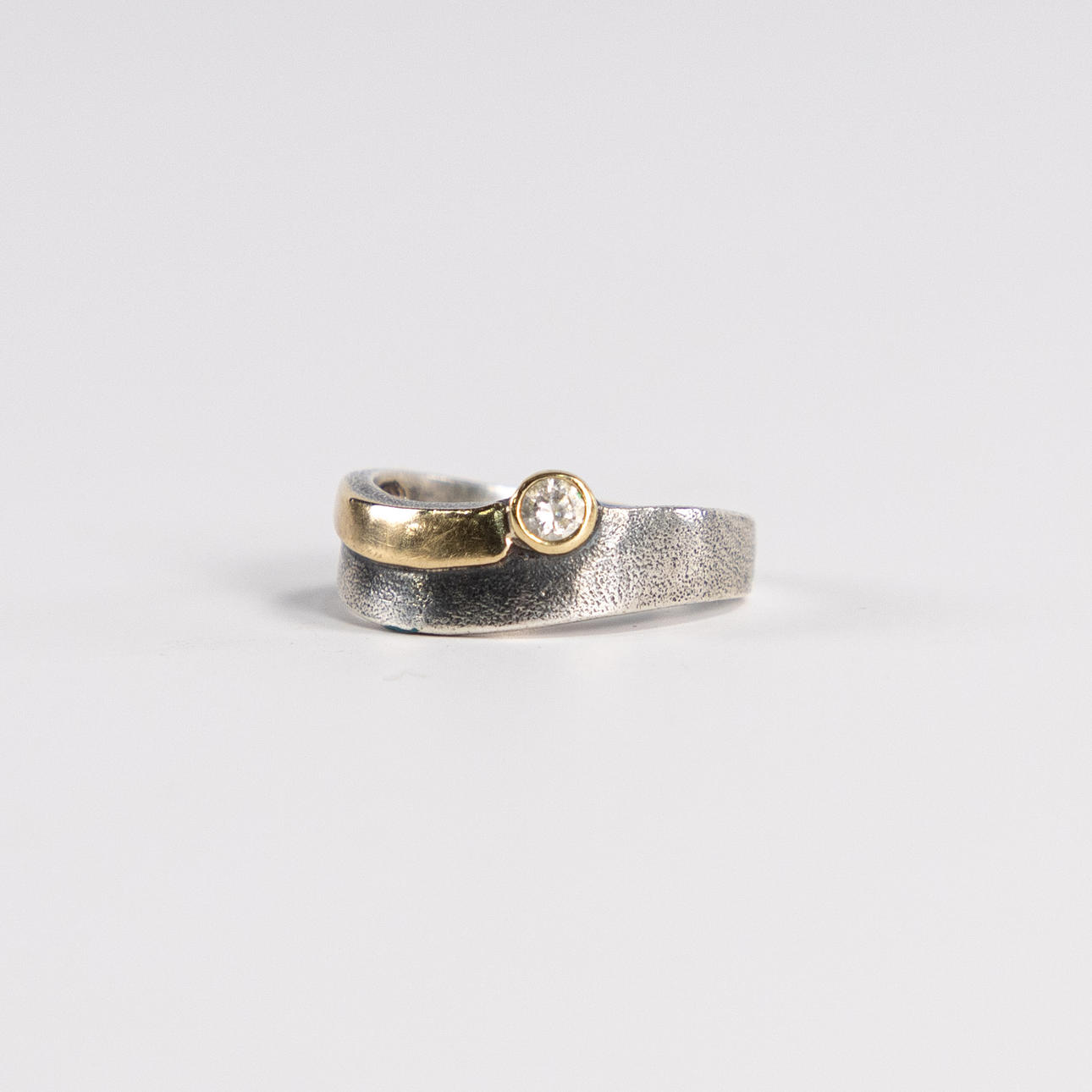 RING. Sterling silver and 14k gold.