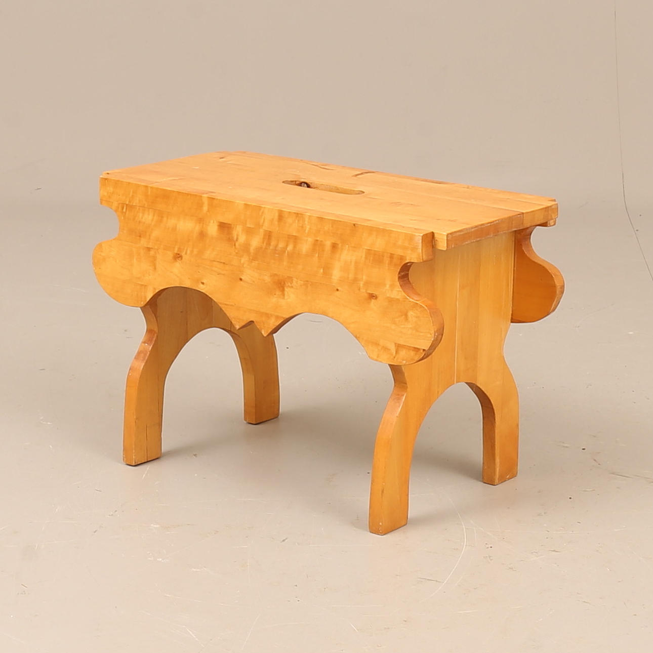 A wooden stool, 20th century.
