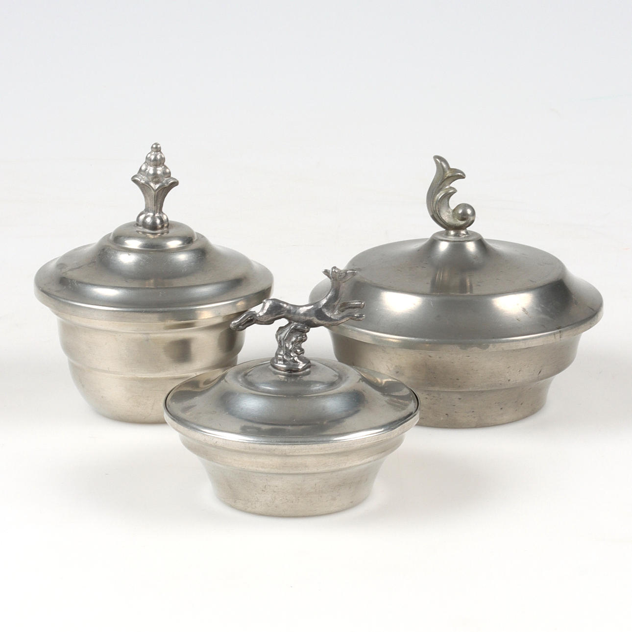 A set of three tin boxes, 1930's.