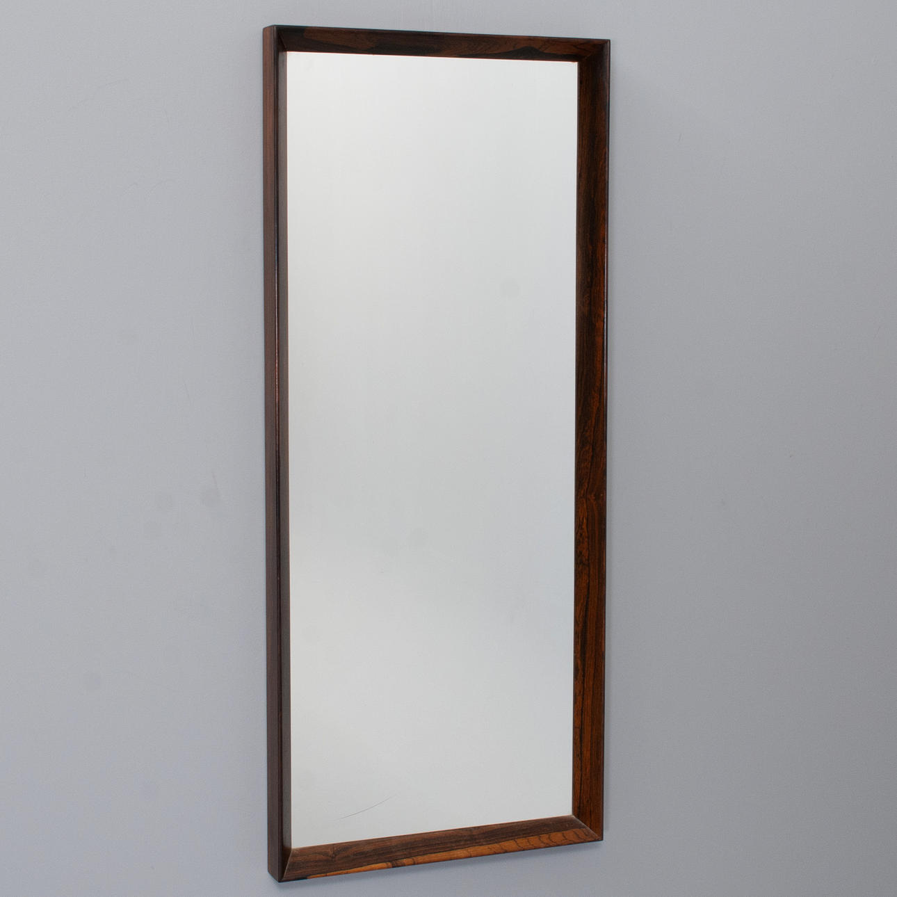 DANISH DESIGN: Rectangular wall mirror in solid rosewood, Denmark, 1960s.