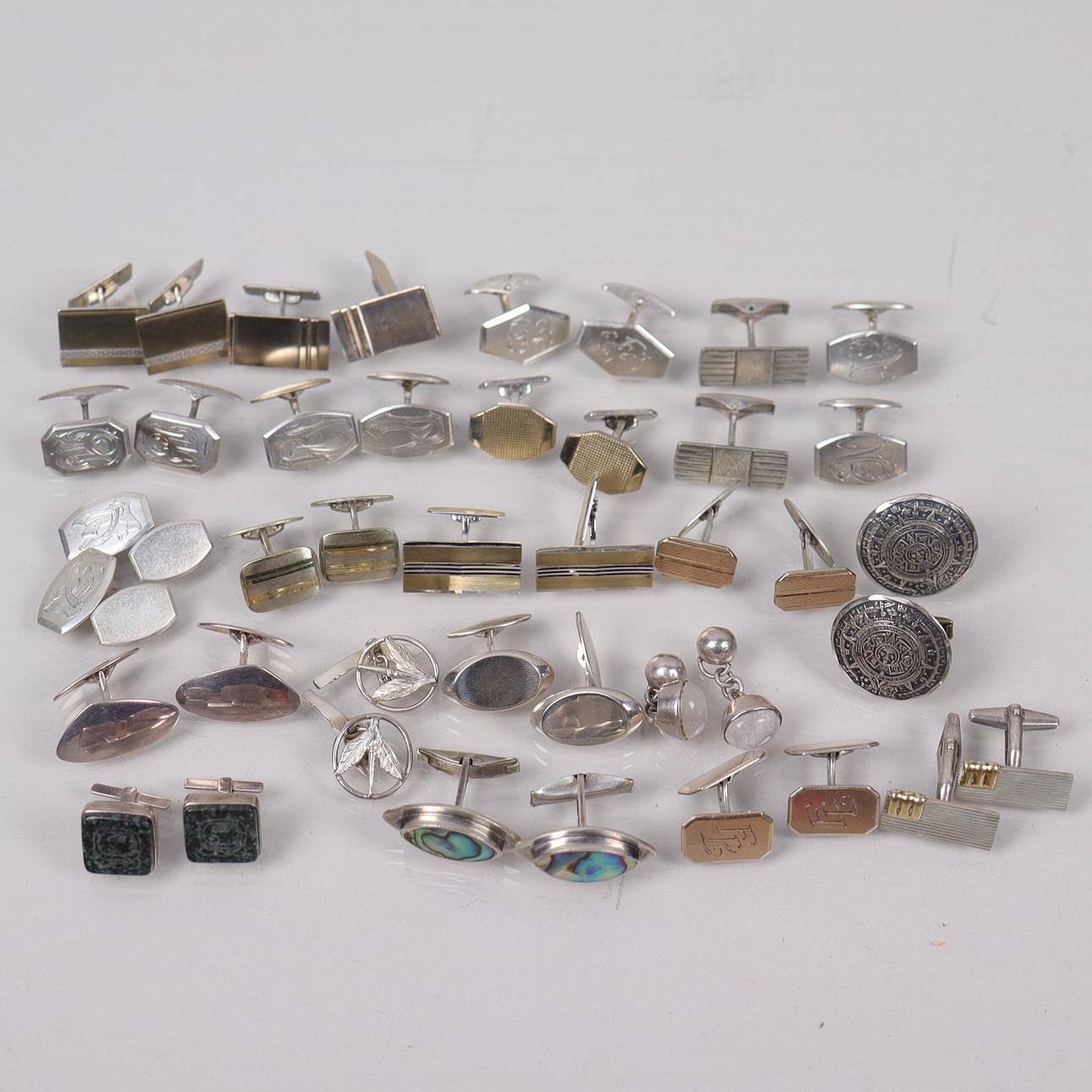 CUFFLINKS, silver, 21 pairs.