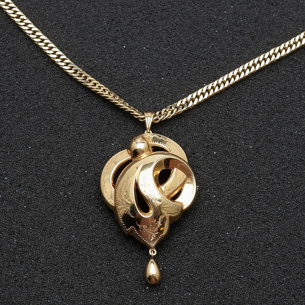 HÄNGSMYCKE/BROSCH, 18K guld, Guldvaruaktiebolaget G. Dahlgren & Co Ab, Malmö, 1959, hängets vikt 4,62 gram.