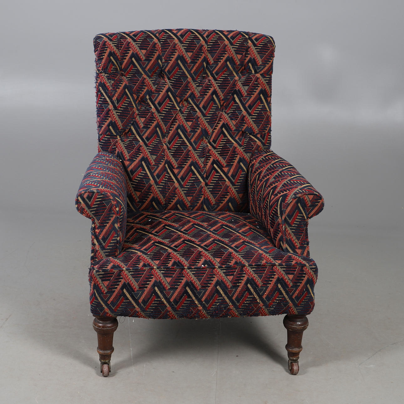 BUTTON BACK ARMCHAIR.