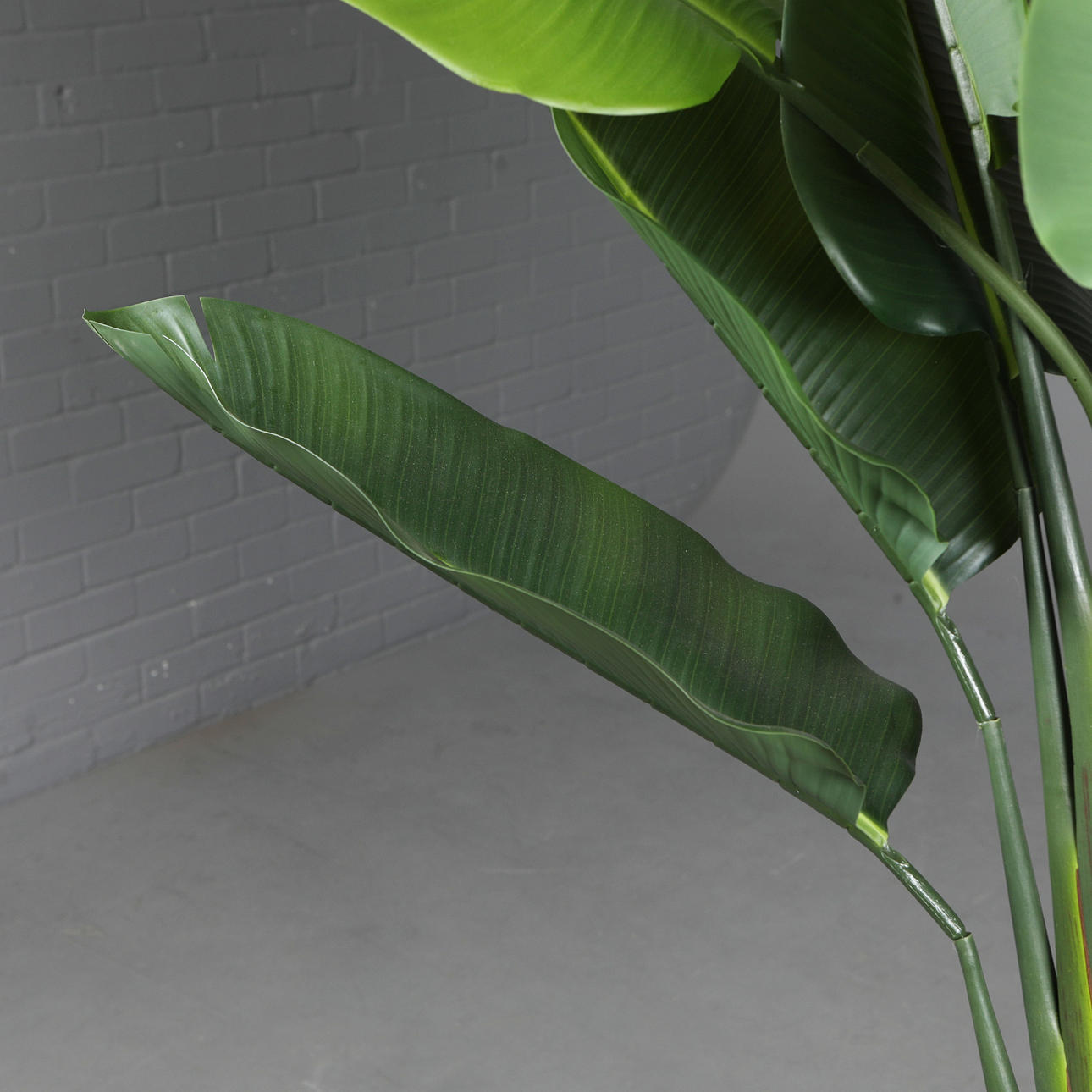 LARGE FAUX BANANA TREE IN A GILT METAL PLANTER. Miscellaneous ...