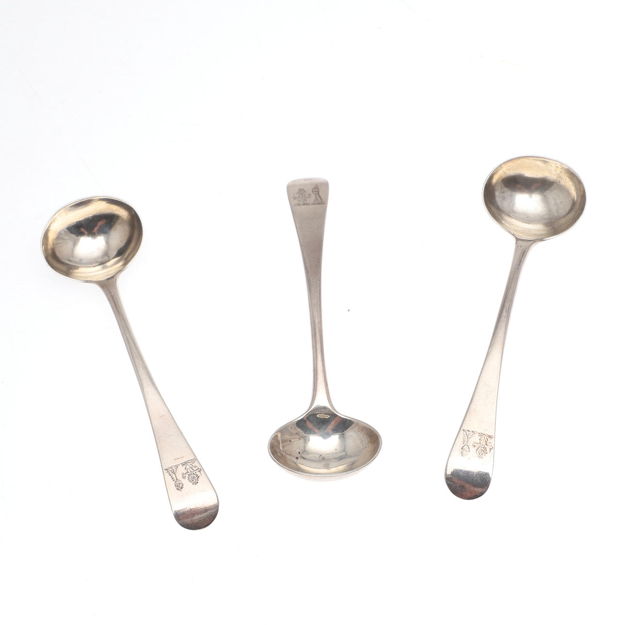 THREE GEORGE III SILVER SALT SPOONS.