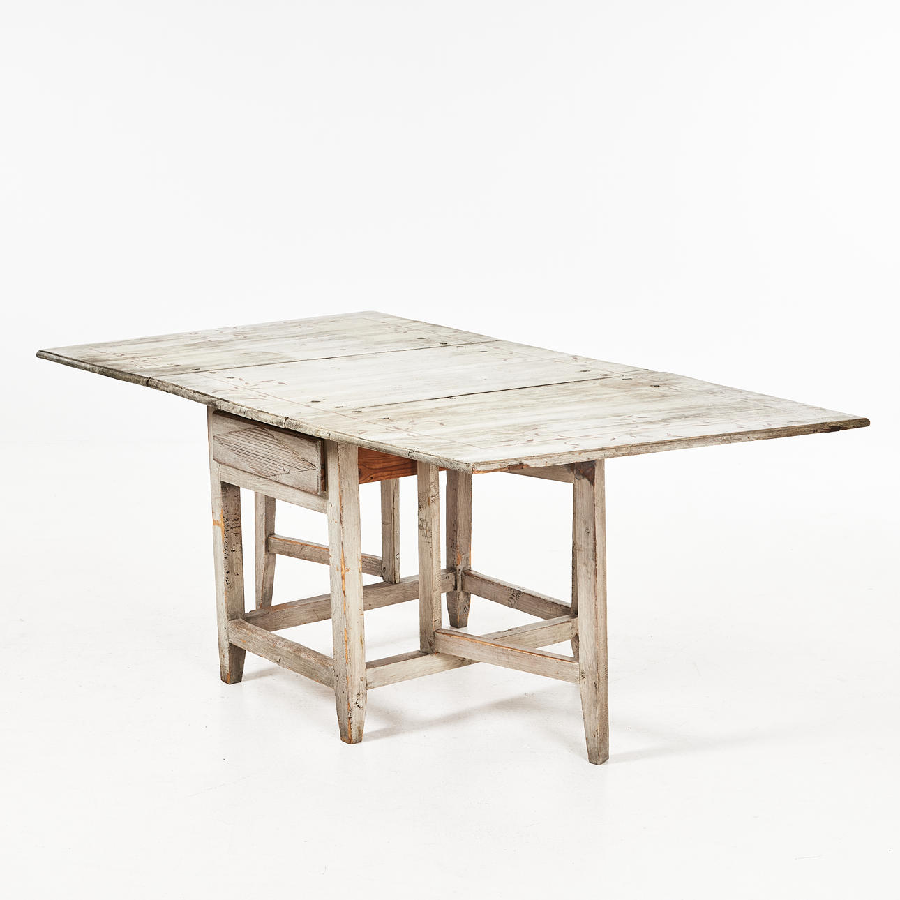 DROP-LEAF TABLE, 19th century, solid pine, painted with garland decoration, fluted decoration on the apron and one drawer.