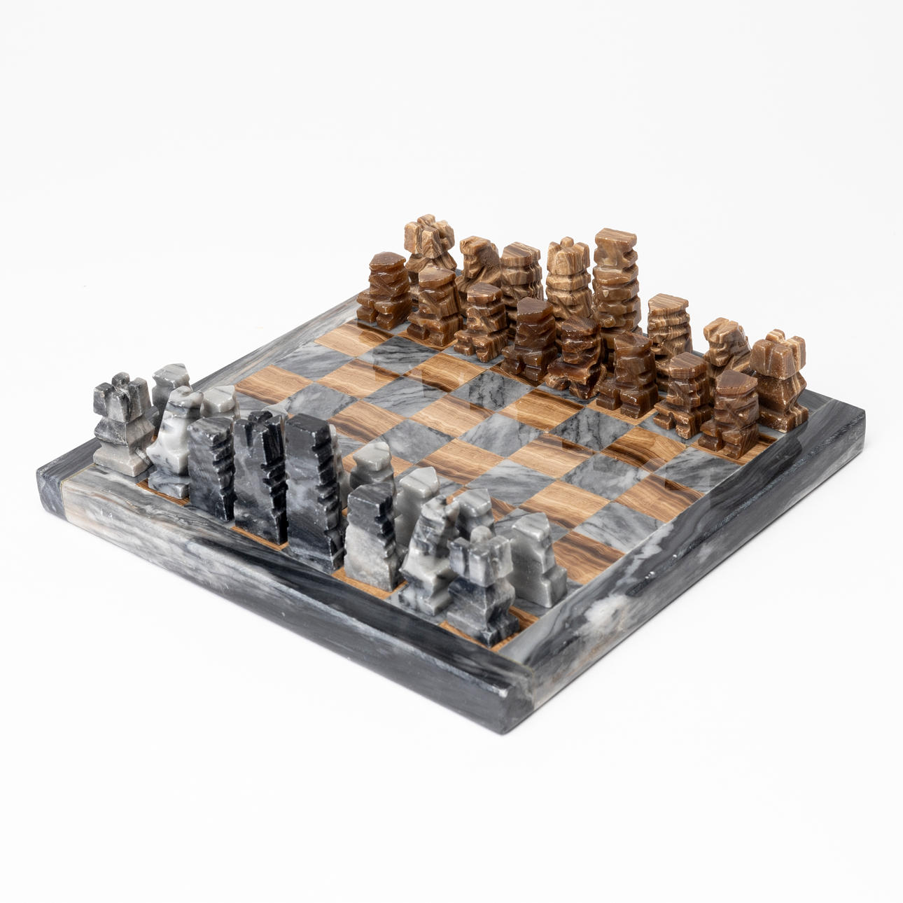 CHESS SET WITH PIECES, stone, 20th century.