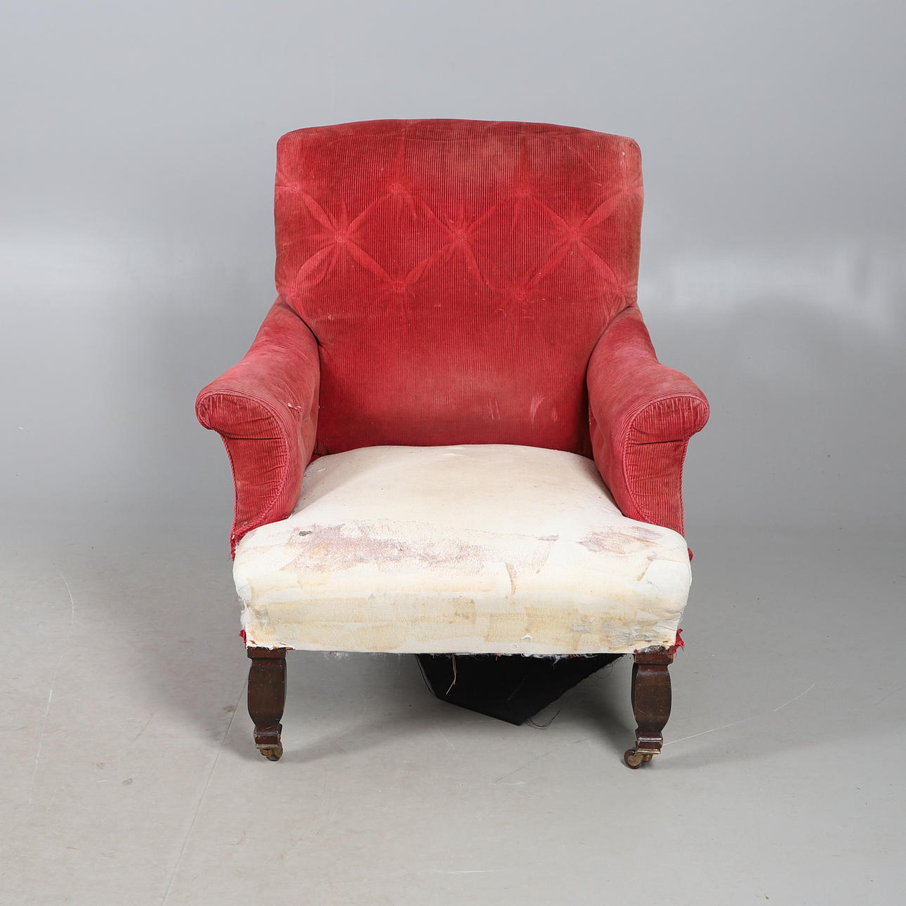 19TH CENTURY BUTTON BACK ARMCHAIR.