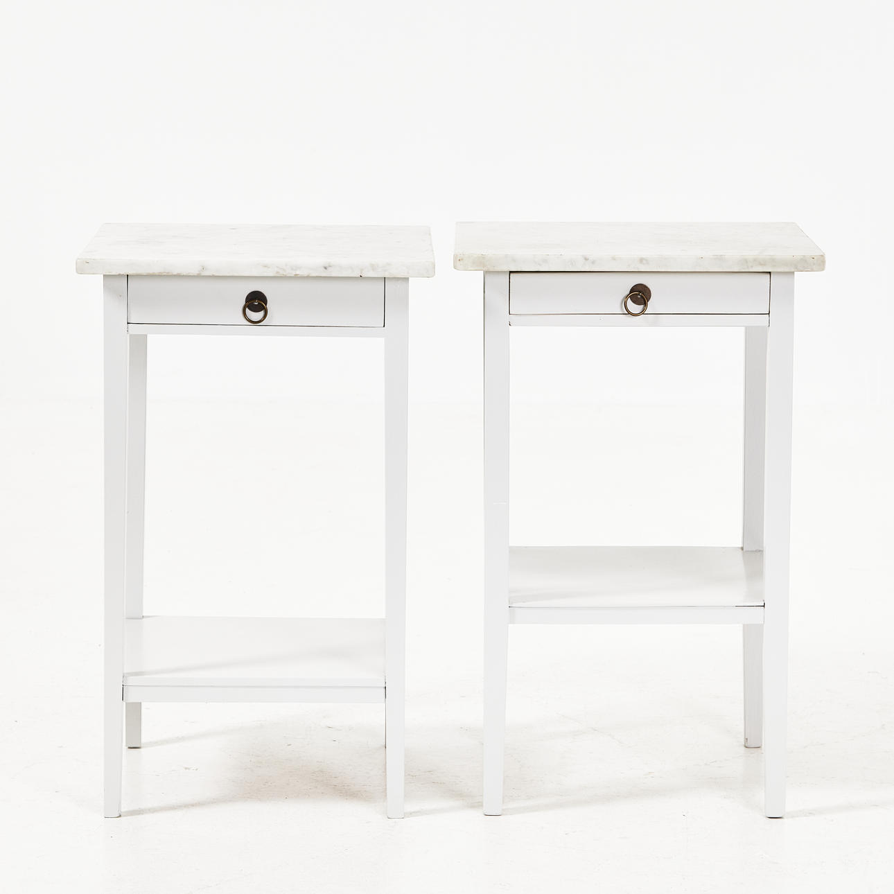 BEDSIDE TABLES, 2 similar, painted, marble tops, brass drawer pulls.