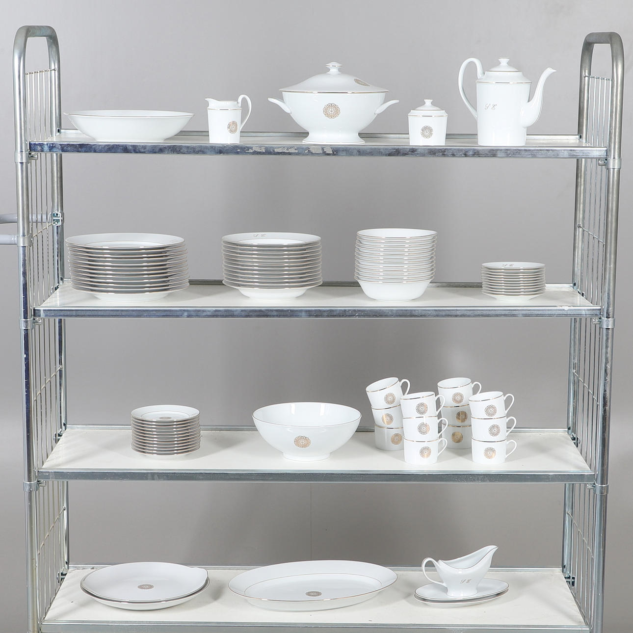 A LIMOGES PART DINNER/TEA SERVICE.