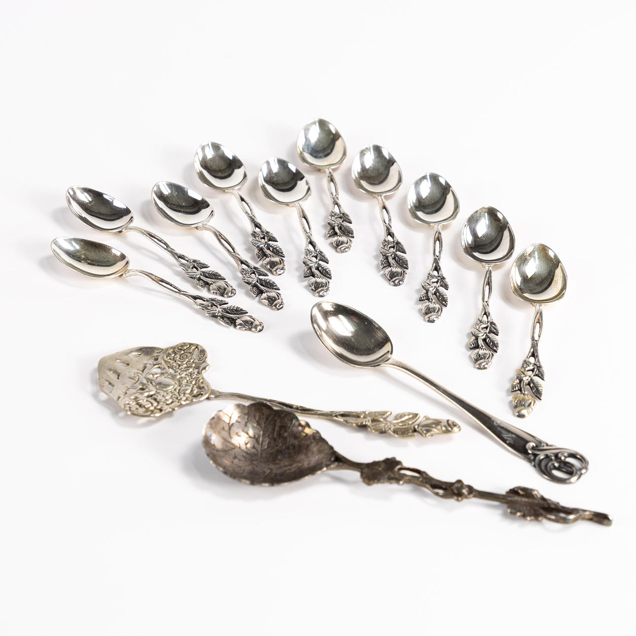 SPOONS. 13 pcs, silver, mostly demitasse spoons.